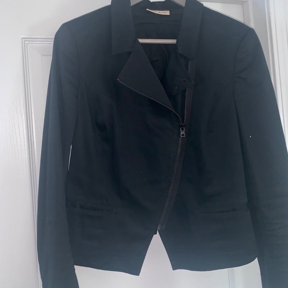 Black zip up jacket.